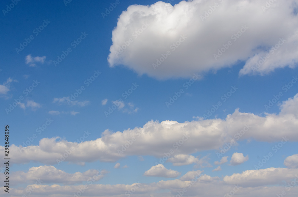 Blue sky with clouds. Background