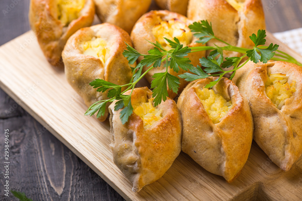 Rasstegai pie with fish filling and rice , egg. Traditional meal of Russian cuisine. Rasstegai pie with fish filling and rice , egg. Traditional meal of Russian cuisine.