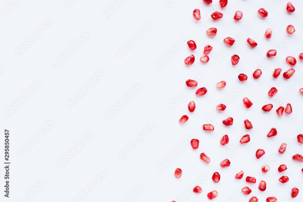 Pomegranate seeds on white background. Pomegranate seeds on white background.