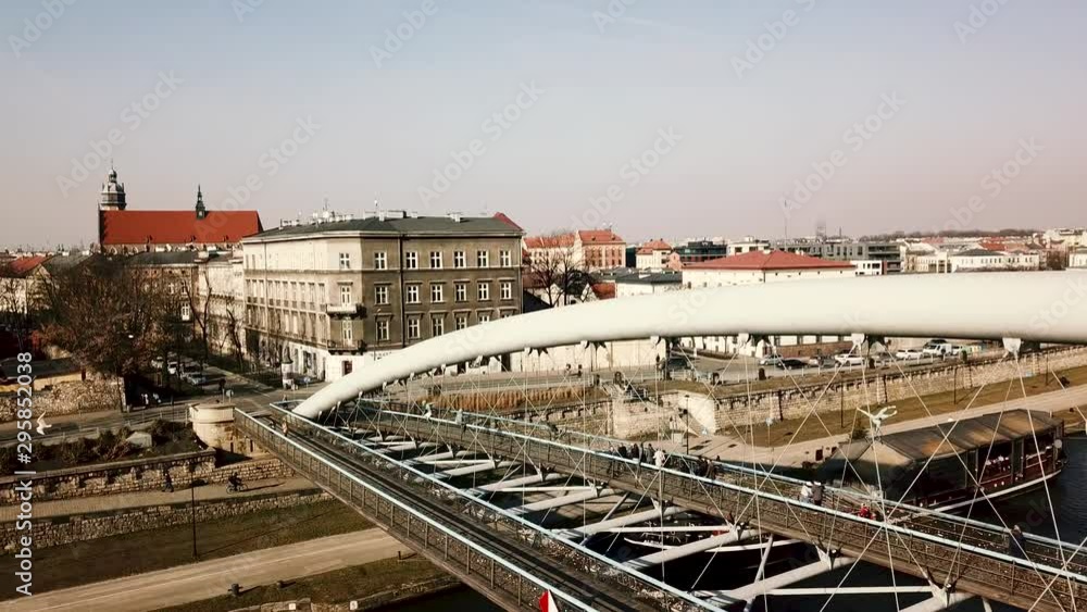 Bridge in Krakow on Vistula or Wisla river. Footbridge of Father Bernatka. Bridge in Krakow on Vistula or Wisla river. Footbridge of Father Bernatka.