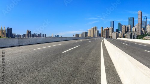 Empty asphalt highway and modern city financial district in chongqing,China.