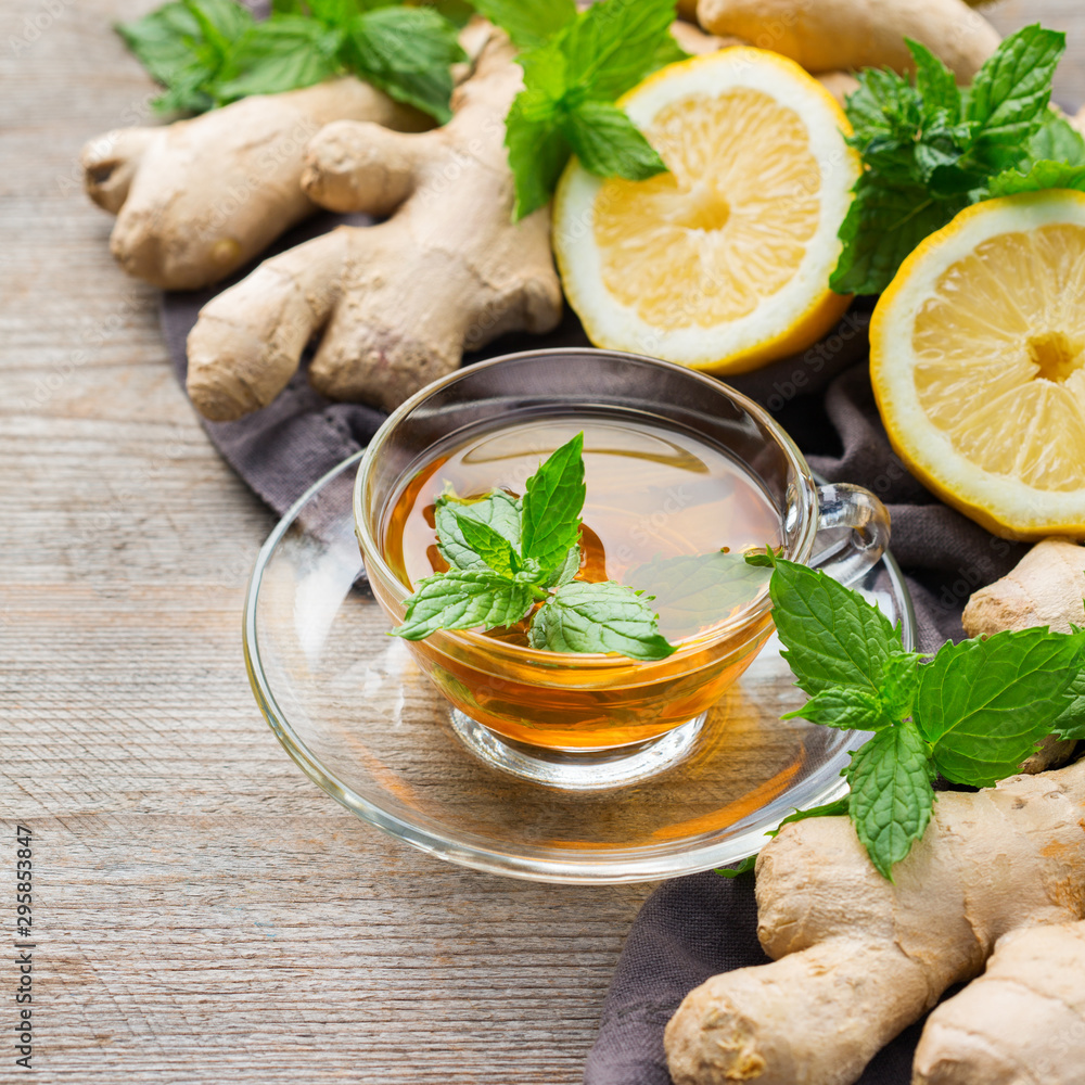 Ginger tea with lemon, mint and honey for flu cold Ginger tea with lemon, mint and honey for flu cold
