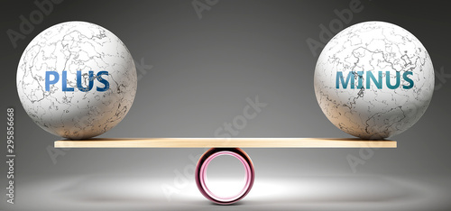Fotografi Plus and minus in balance - pictured as balanced balls on scale that symbolize harmony and equity between Plus and minus that is good and beneficial