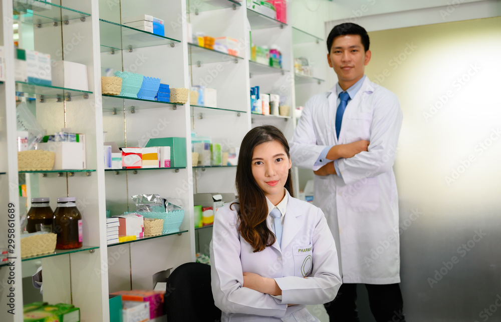 woman and man pharmacist standing by in drug pharmacy shop for incoming customer consultant