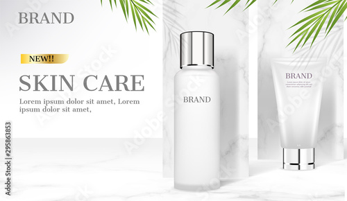 Skincare products on marble background with green coconut leaves