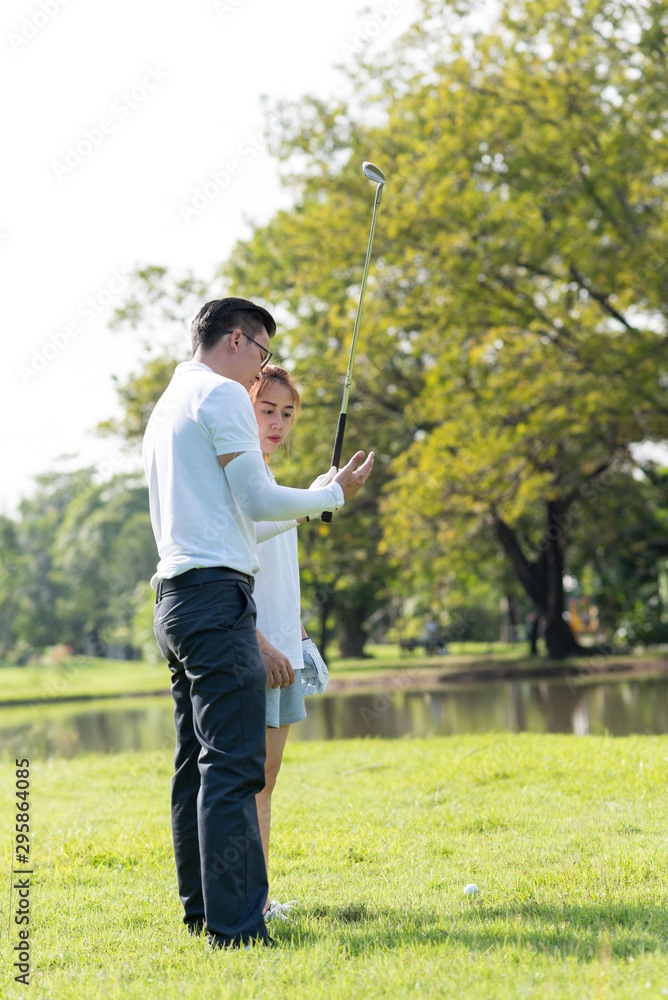 Trainer golf tutor practice for new golf player. Trainer golf tutor practice for new golf player.