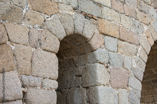 Stone eye of historic Roman bridge in Spain