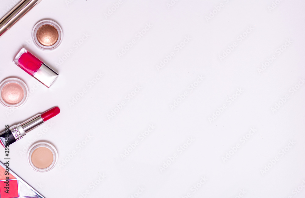 decorative cosmetics scattered on a white background with copy space decorative cosmetics scattered on a white background with copy space