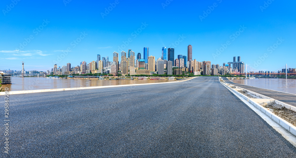 Empty asphalt highway and modern city financial district in chongqing,China.