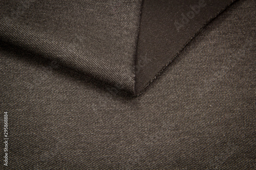 Coat of gray fabric. Texture of coat fabric