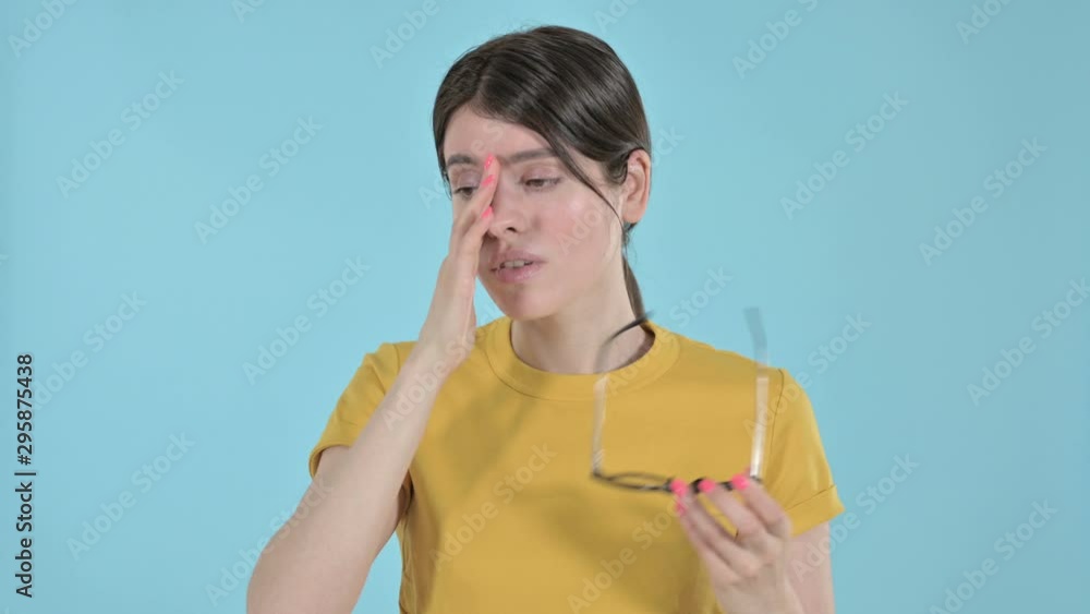 Stressed Young Woman Having Headache on Purple Background 