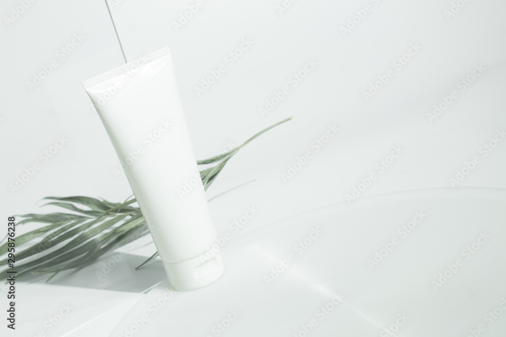 fresh beauty spa medical skincare and cosmetic lotion cream facial bottle packaging product on white decor background with summer season sun light fresh beauty spa medical skincare and cosmetic lotion cream facial bottle packaging product on white decor background with summer season sun light