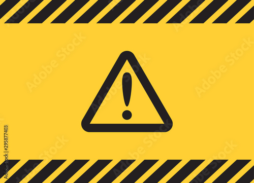 Warning caution attention triangle sign on yellow banner background. photo