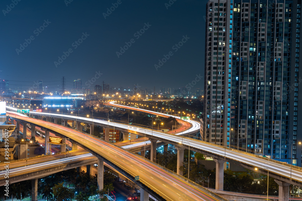 Naklejka premium Twilight view city-scape commercial modern building and condominium in Rama 9 road Intersection area, Bangkok ,Thailand