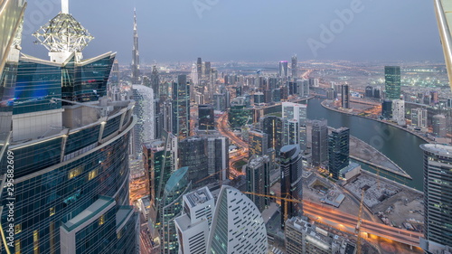 Photography Panoramic aerial view of business bay towers in Dubai day to night timelapse