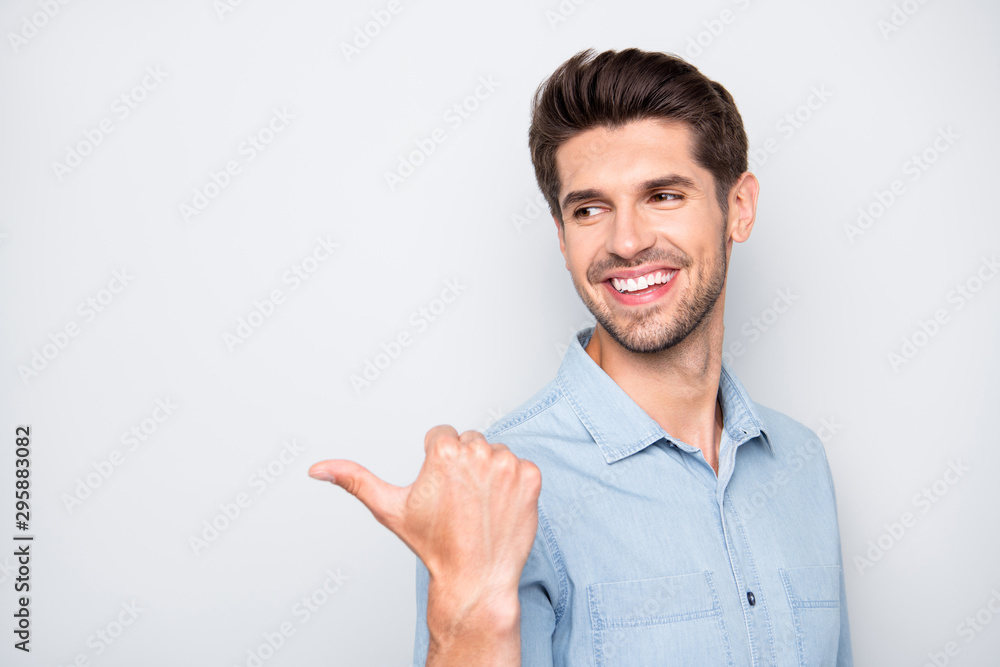 Close up photo of positive successful man promoter want give feedback about discounts promotion recommend ads wear stylish clothes isolated over grey color background Close up photo of positive successful man promoter want give feedback about discounts promotion recommend ads wear stylish clothes isolated over grey color background