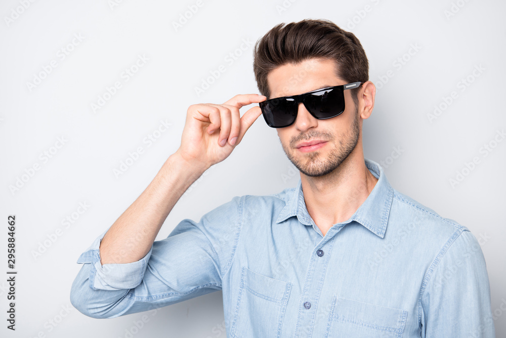 Close up photo of magnificent gorgeous man touch his specs look attract girls like true best guy in university wear casual outfit isolated over grey color background Close up photo of magnificent gorgeous man touch his specs look attract girls like true best guy in university wear casual outfit isolated over grey color background