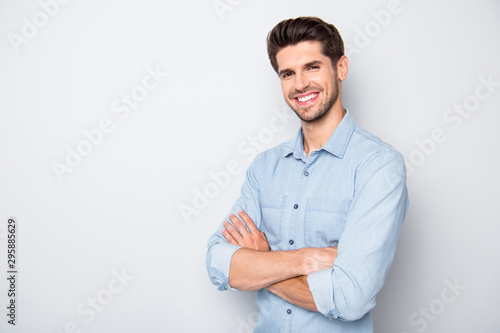 Turned photo of positive cheerful man feel content want be true leader in his enterprise wear denim jeans clothes isolated over grey color background
