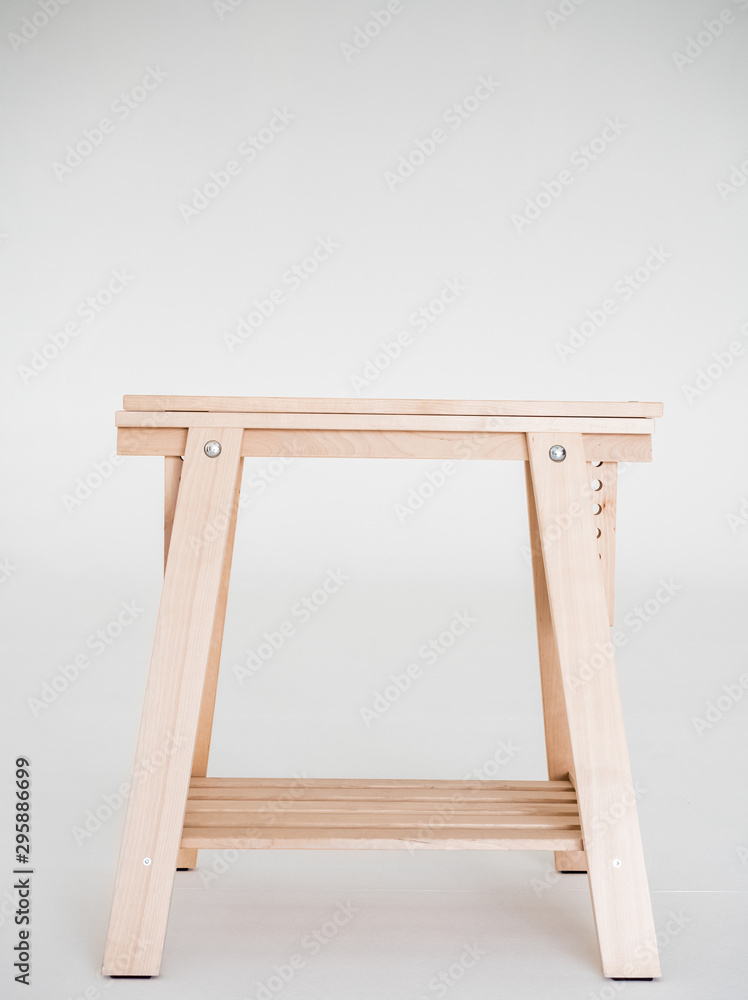 Cream-colored wood on a white sprain background texture Cream-colored wood on a white sprain background texture