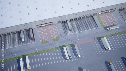 Time lapse and top view of warehouse, logistics park with loading hub, a lot of semi-trailers trucks at ramps during load and unload goods. 3d 60 fps animation.