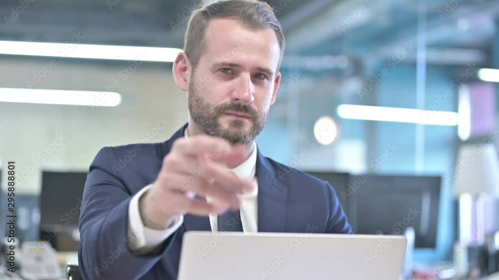 Portrait of Young Businessman Inviting with Hand Sign Portrait of Young Businessman Inviting with Hand Sign