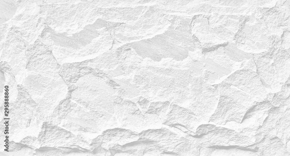 White stone grunge background, rough rock wall texture