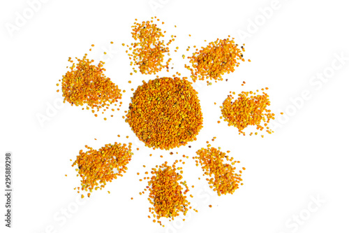 The sun shaped isolated bee pollen grains on a white background. Healthy natural medicine concept