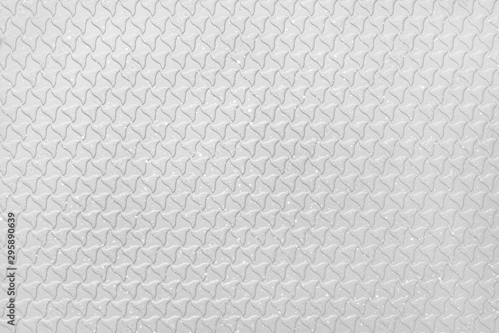 Abstract gray background. The texture of the surface of the grill pan. Abstract gray background. The texture of the surface of the grill pan.