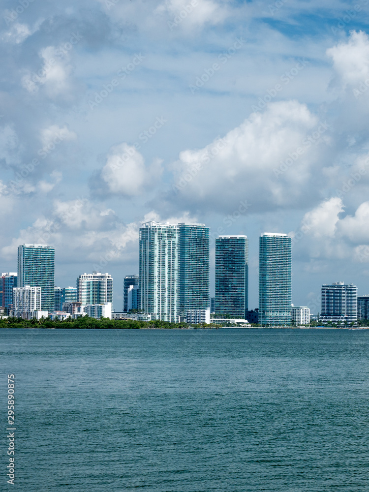 Fototapeta premium view of Miami downtown skyline at sunny and cloudy day with amazing architecture
