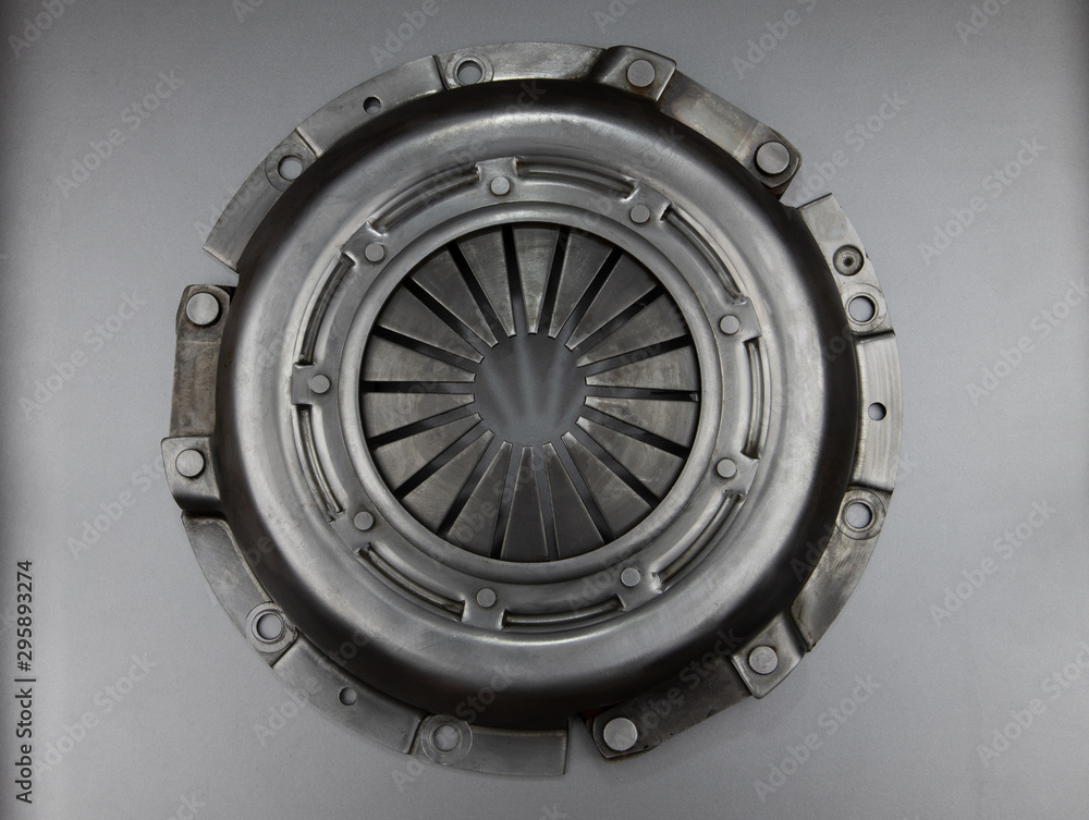 Clutch car basket on a gray background. Top view car service. Clutch car basket on a gray background. Top view car service.