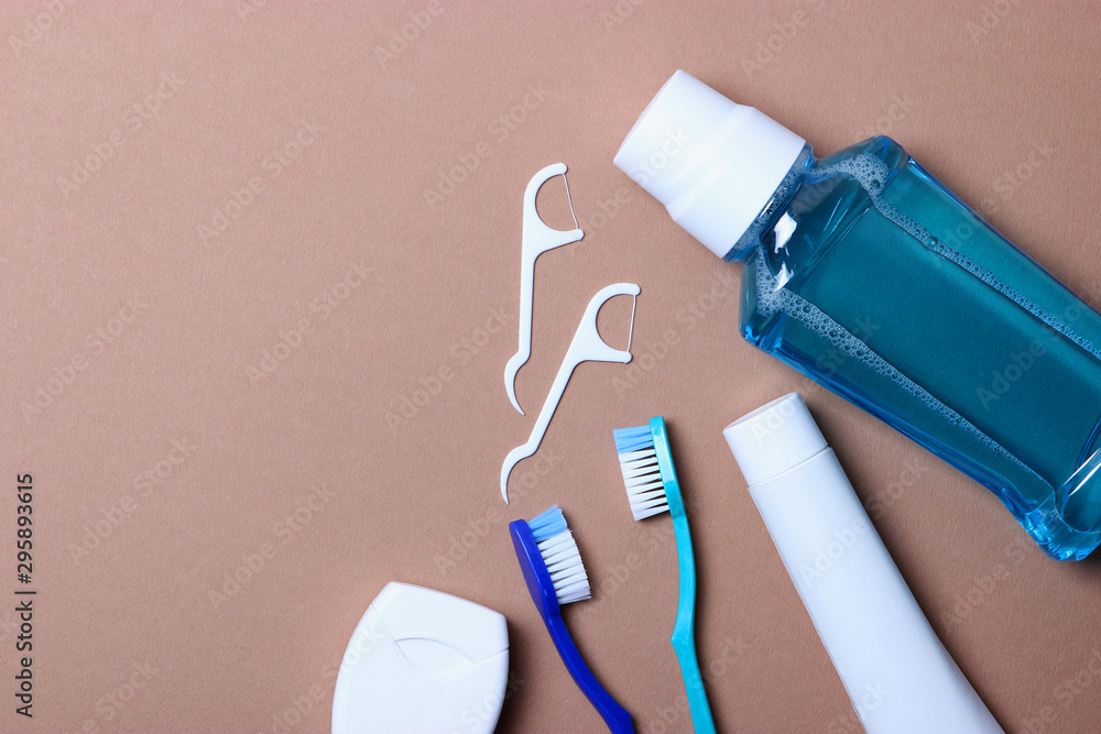 Fototapeta premium Flat composition for oral care and place for text on a light background. Dental hygiene