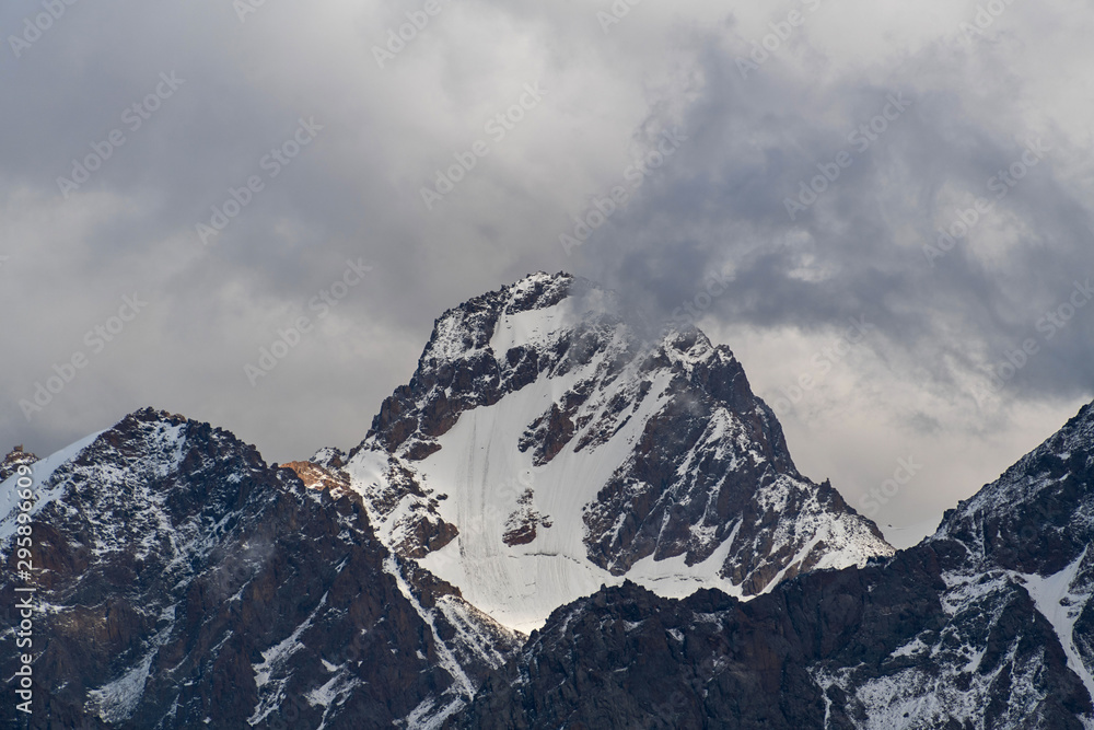 Mountain landscape with snow peaks Mountain landscape with snow peaks