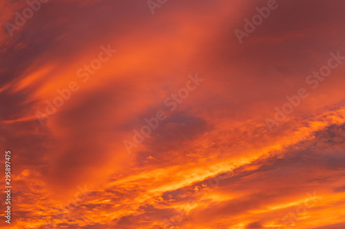 Dramatic fiery sky sunset cloudscape at dusk © Juhku