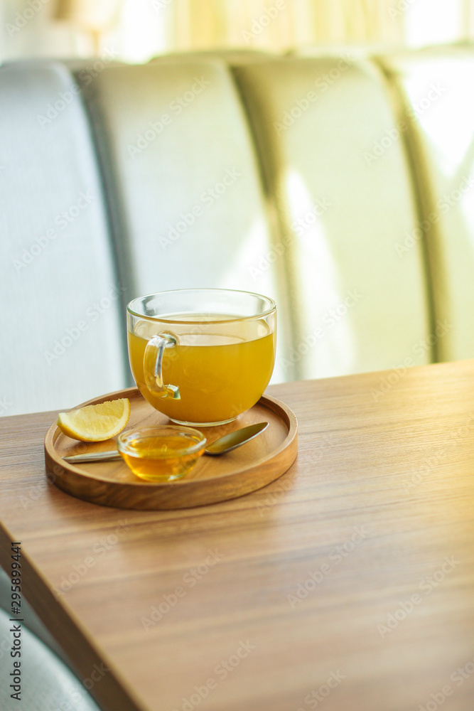 tea, honey, lemon and sea buckthorn (aromatic mustard drink in a cafe restaurant) menu concept. food background. copy space. Top view tea, honey, lemon and sea buckthorn (aromatic mustard drink in a cafe restaurant) menu concept. food background. copy space. Top view