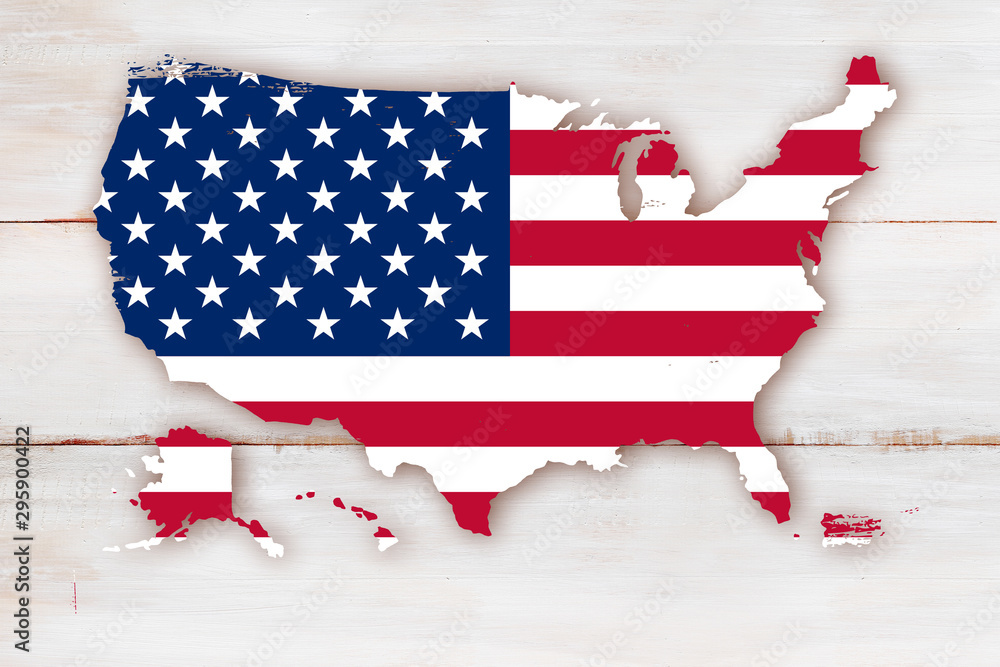 The USA flag embedded in the outline of the state borders on a wooden background