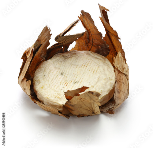 banon a la feuille, french goat cheese is wrapped in chestnut leaves photo