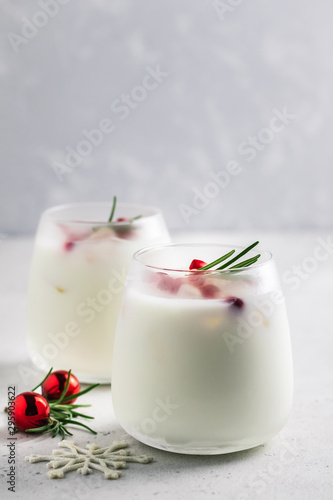 Festive pomegranate rosemary mocktail. Selective focus, space for text.