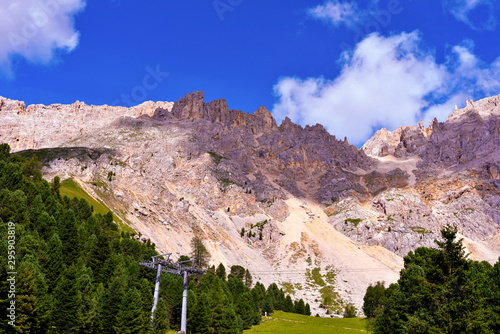 jumps towards the refuge path tower of Pisa latemar (predazzo pampeago) dolomites autonomous province of Bolzano Italy photo