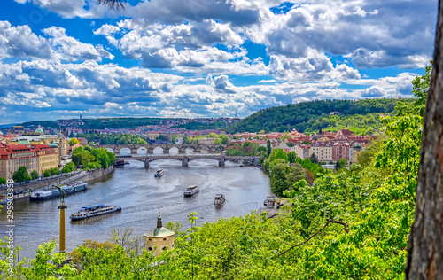 Photography A view of Prague, Czech Republic and the Vltava River from Letna Gardens on a sunny day