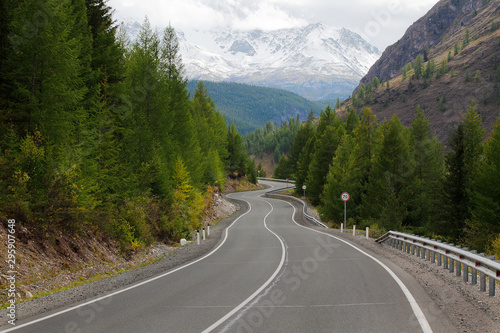 Asphalt road leading to the mountains. © NilovSergey