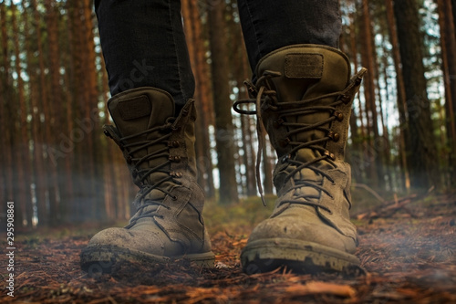 hiking boots on a wooden background