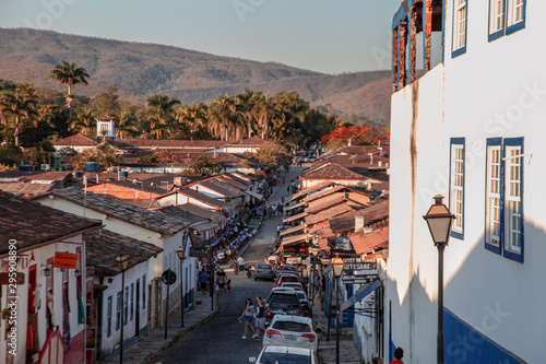 Pirenopolis, Goias, Brazil, October 17, 2019: Slopes and heavily wooded cobblestone streets with many cars in the historic center of Pirenopolis, with bars, restaurants, craft shops and entertainment.