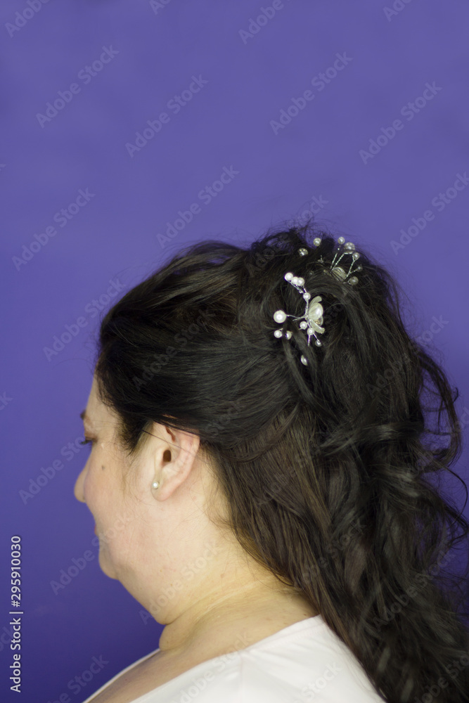 Naklejka premium Portrait of woman with princess style hairstyle