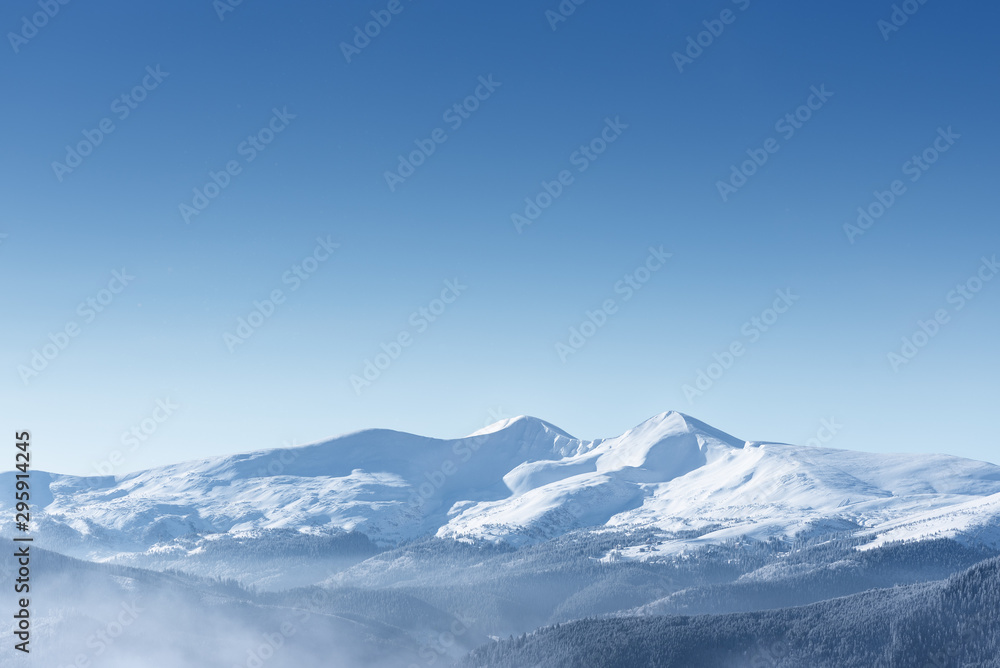 Snow capped mountain peaks