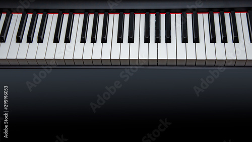 piano keys two octaves on back background