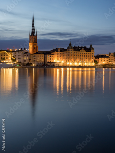 Beautiful old buildings reflect in the water in Stockholm  Sweden.