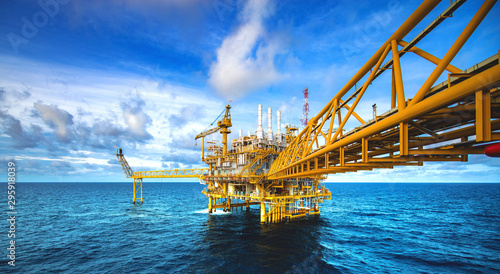 Offshore oil and gas rig platform with beautiful sky in the gulf of Thailand.