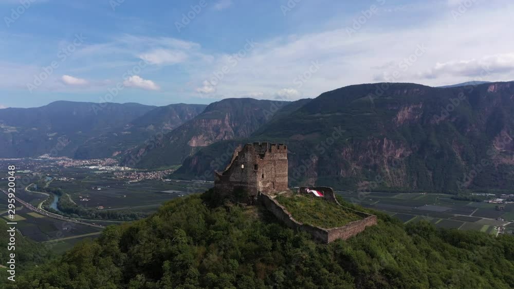 Aerial view. A beautiful panorama of the ruins of Castelchiaro castle in the municipality of Kaltern in South Tyrol, Italy. Flying on drone. Aerial view. A beautiful panorama of the ruins of Castelchiaro castle in the municipality of Kaltern in South Tyrol, Italy. Flying on drone.