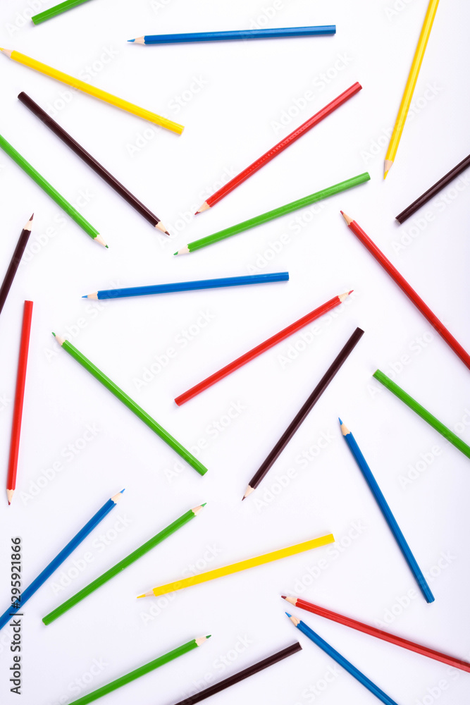 Many different colored pencils on a white background with a place for text and cory space . Many different colored pencils on a white background with a place for text and cory space .