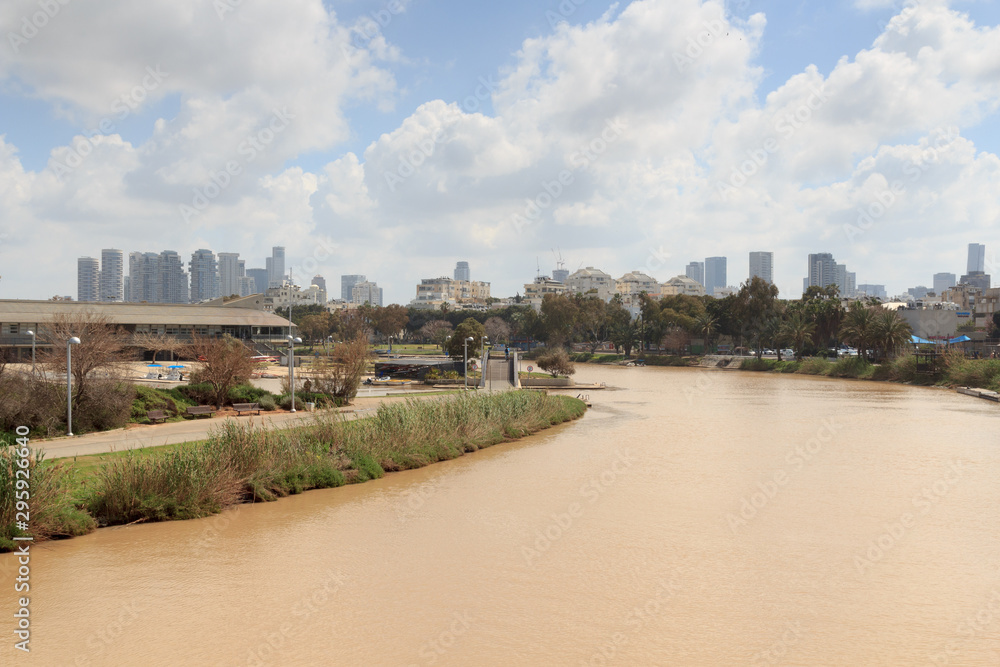 Yarkon park with Yarkon river and skyline in Tel Aviv, Israel Yarkon park with Yarkon river and skyline in Tel Aviv, Israel